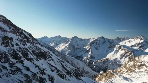 Aerial drone snow mountains range sunrise Stock Footage 168989664