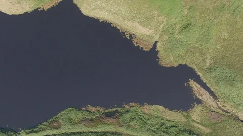 Aerial drone straight down over reservoir, Yorkshire Video stock 122925756