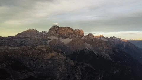 Aerial Drone Sunset Over Dramatic Dolomites Peaks, Italian Alps Golden Hour Stock Footage 327732544