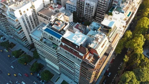 Aerial drone sunset, Tree park and Skyscraper buildings, Palermo, Buenos Aires Stock Footage 100895320