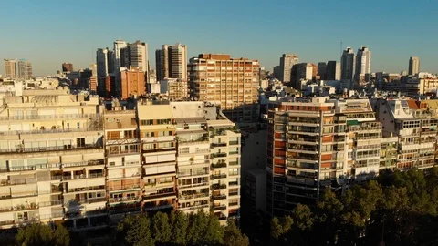 Aerial drone sunset, Tree park and Skyscraper buildings, Palermo, Buenos Aires Stock Footage 100895857