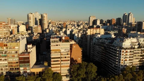 Aerial drone sunset, Tree park and Skyscraper buildings, Palermo, Buenos Aires Stock Footage 100897088