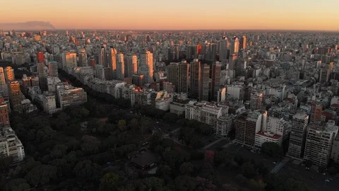 Aerial drone sunset, Tree park and Skyscraper buildings, Palermo, Buenos Aires Stock Footage 100899094