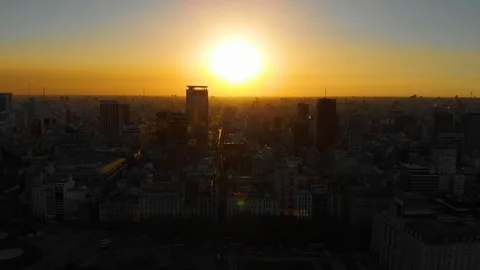Aerial drone sunset view of Buenos Aires downtown Skyscrapers Buildings, low sun Stock Footage 100838194