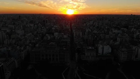 Aerial drone sunset view of Buenos Aires downtown Skyscrapers Buildings, low sun Stock Footage 100885587