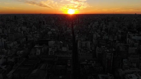 Aerial drone sunset view of Buenos Aires downtown Skyscrapers Buildings, low sun Stock Footage 100885626