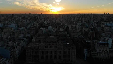 Aerial drone sunset view of Buenos Aires downtown Skyscrapers Buildings, low sun Stock Footage 100885726