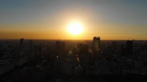 Aerial drone sunset view of Buenos Aires downtown Skyscrapers Buildings, low sun Video stock 100887006