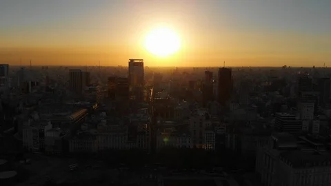 Aerial drone sunset view of Buenos Aires downtown Skyscrapers Buildings, low sun Video stock 100887094