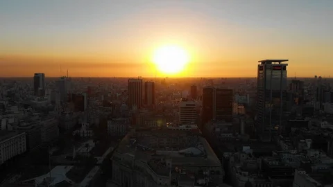 Aerial drone sunset view of Buenos Aires downtown Skyscrapers Buildings, low sun Video stock 100887225