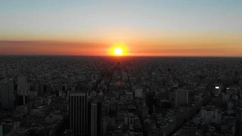 Aerial drone sunset view of Buenos Aires downtown Skyscrapers Buildings, low sun Stock Footage 100887458