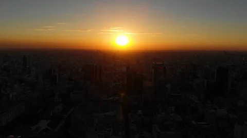 Aerial drone sunset view of Buenos Aires downtown Skyscrapers Buildings, low sun Stock Footage 100887561