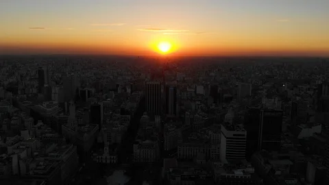 Aerial drone sunset view of Buenos Aires downtown Skyscrapers Buildings, low sun Video stock 100887758