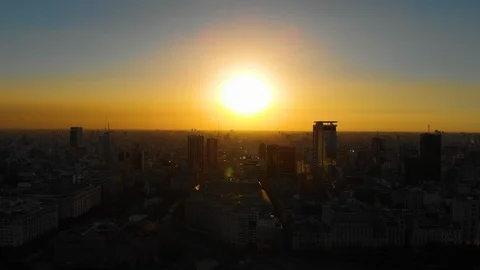 Aerial drone sunset view of Buenos Aires downtown Skyscrapers Buildings, low sun Video stock 100887804