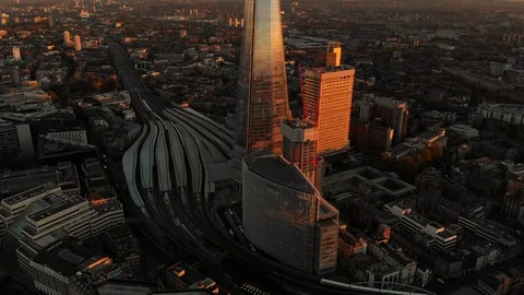 Aerial Drone Sunset View Reveal Shot Of Shard Building And London City Rooftops Stock Footage