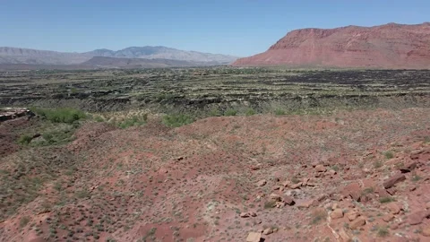 Aerial drone through mountain valley over lava rock Stock Footage 139930822