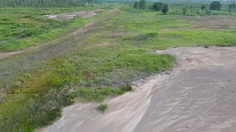 Aerial Drone Tilt Down Over Excavated Land Terrain 4k Vídeos de archivo 337639065