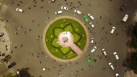 Aerial Drone - Time Lapse of Busy Traffic Circle - Ho Chi Minh City - Vietnam Stock Footage 87223486