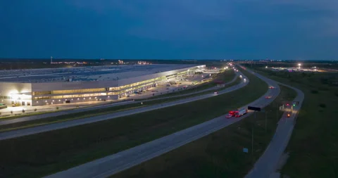 Aerial drone time lapse of Tesla Gigafactory factory building in Austin Texas Stock Footage 254763075
