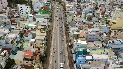 Aerial Drone - Time Lapse Traffic on Busy Street - Ho Chi Minh City Vietnam Video stock 88480224