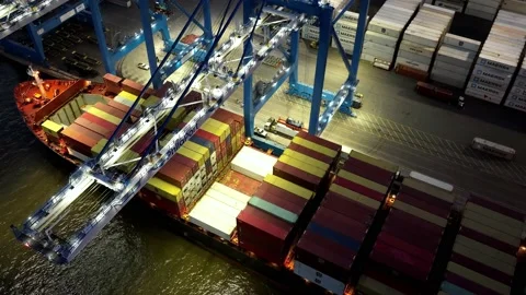 Aerial Drone Timelapse of a Cargo Ship Being Loaded in Port Stock Footage 167715795