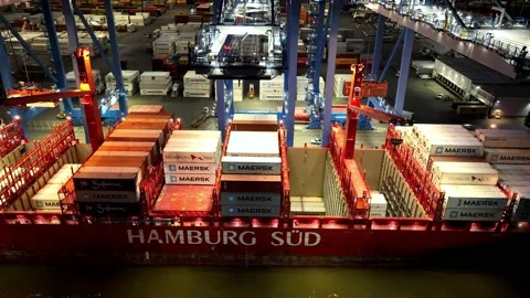 Aerial Drone Timelapse of Cargo Ship Being Loaded and Unloaded in Port Stock Footage 186411346