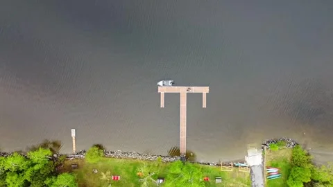 Aerial Drone Top Down Birds Eye View Flying Slowly Over Lake Jetty, Lac Megantic Stock Footage 267796059