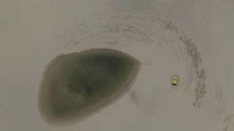 Aerial drone top down of car driving in sand dunes Brazil BR FOR DJI 0368 A Stock Footage 140180885