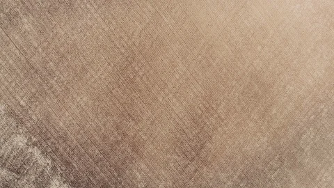 Aerial Drone top-down empty agricultural arid field Stock Footage 130047041