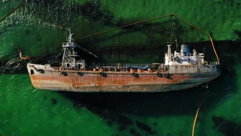 Aerial drone top down flight over crushed tanker ship Delfi in Black sea near Stock Footage 123052458