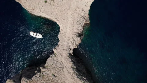 Aerial drone top down menorca large hole shaped Pont d'en Gil Stock Footage 238993792
