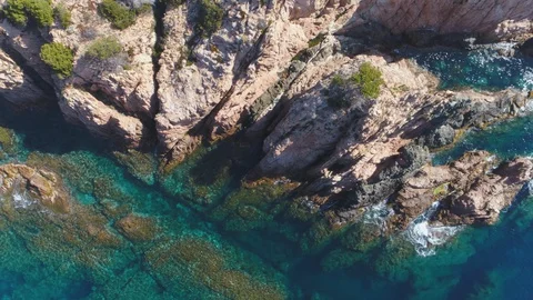 AERIAL DRONE TOP DOWN SHOT OF MEDITERRANEAN ROCKY SEA SIDE Stock Footage 130095806