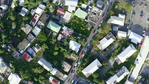 Aerial drone top down shot gliding over Caribbean town in Saint Martin Stock Footage 137495172