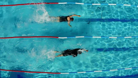 Aerial drone top down shot of swimmers s... | Stock Video | Pond5