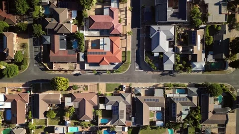 Aerial drone top down sideways panning View of Suburban Neighborhood Stock Footage 270408653
