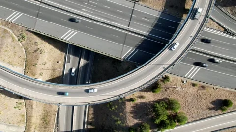Aerial drone top down timelapse of elevated highway junctions and interchange Stock Footage 248712603