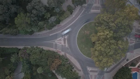 Aerial drone top down timelapse video of roundabout road junction and interchang Stock Footage 252189393
