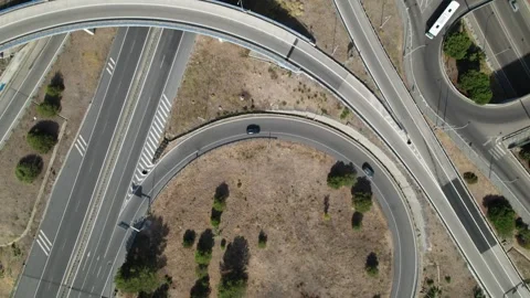 Aerial drone top down tracking elevated highway junctions and interchange Stock Footage 248712066
