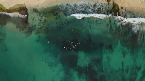 Aerial drone top down view at emerald water at the balinese beach, Indonesia, 4k Stock Footage 122158310