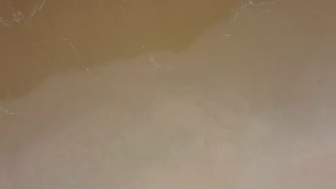 Aerial Drone Top Down View - Waves Crashing in a Beach with Golden Sand - Ave Video stock 153585776