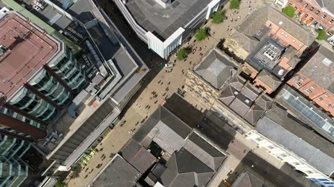 Aerial Drone top down view of high street on sunny day shopping Stock Footage 161967375