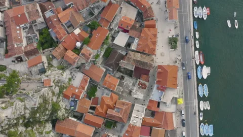 Aerial / Drone top down view of Old Town Omis, Croatia Видео 170877103
