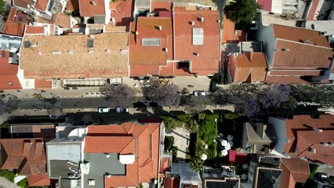 Aerial drone top down view panning a street in Cascais, Portugal Stock Footage 241349548