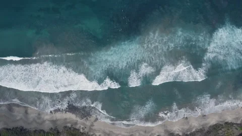 Aerial Drone Top Down view of surfers and wave patterns Stock Footage 242116972