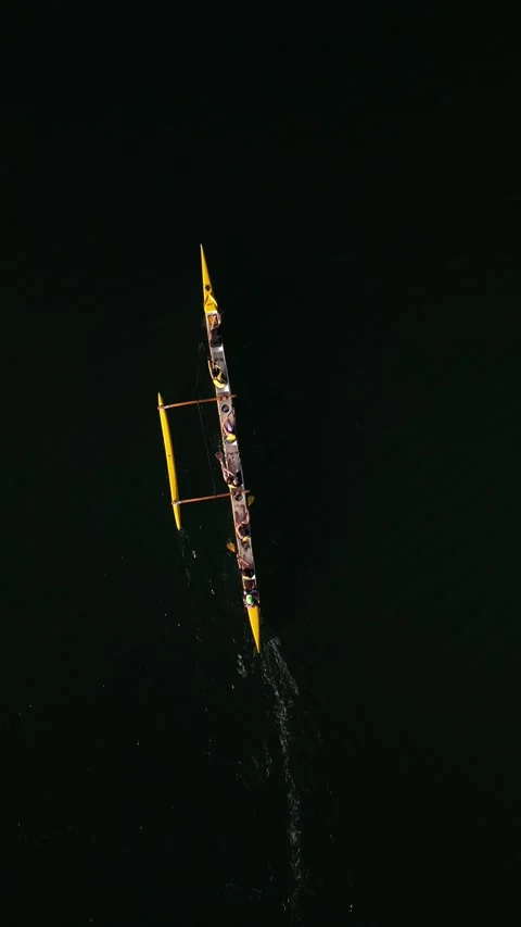 Aerial drone top down View of a Single Scull Rowing on a Tranquil Lake at Dawn Stock Footage 274763206