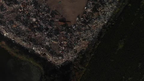 Aerial drone top down view of a commercial landfill garbage dump Stock Footage 284453247