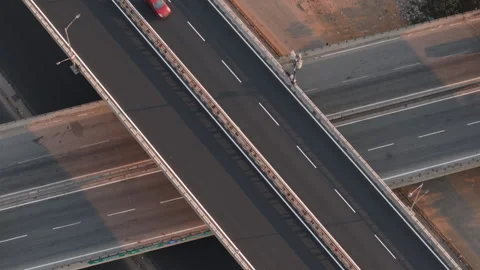 Aerial (Drone) top down view of traffic criss-crossing in Bengaluru, India Stock Footage 303883992