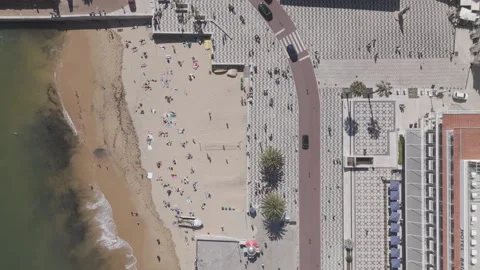 Aerial drone top down view of Praia da Ribeira in Cascais, Portugal Stock Footage 305261411