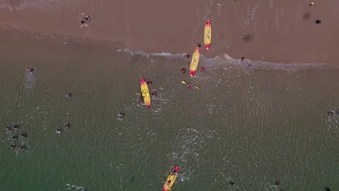 Aerial drone top down view of a crowded beach Stock Footage 312057517
