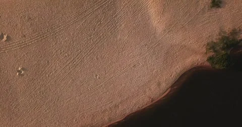 Aerial drone top-down view of ocean waves on Macaé coast, RJ Stock Footage 317731230